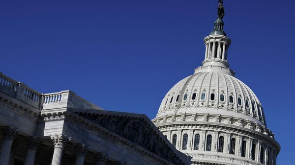 A general view of the U.S. Capitol under blue skies in Washington, U.S. December 14, 2021.  - Sputnik International