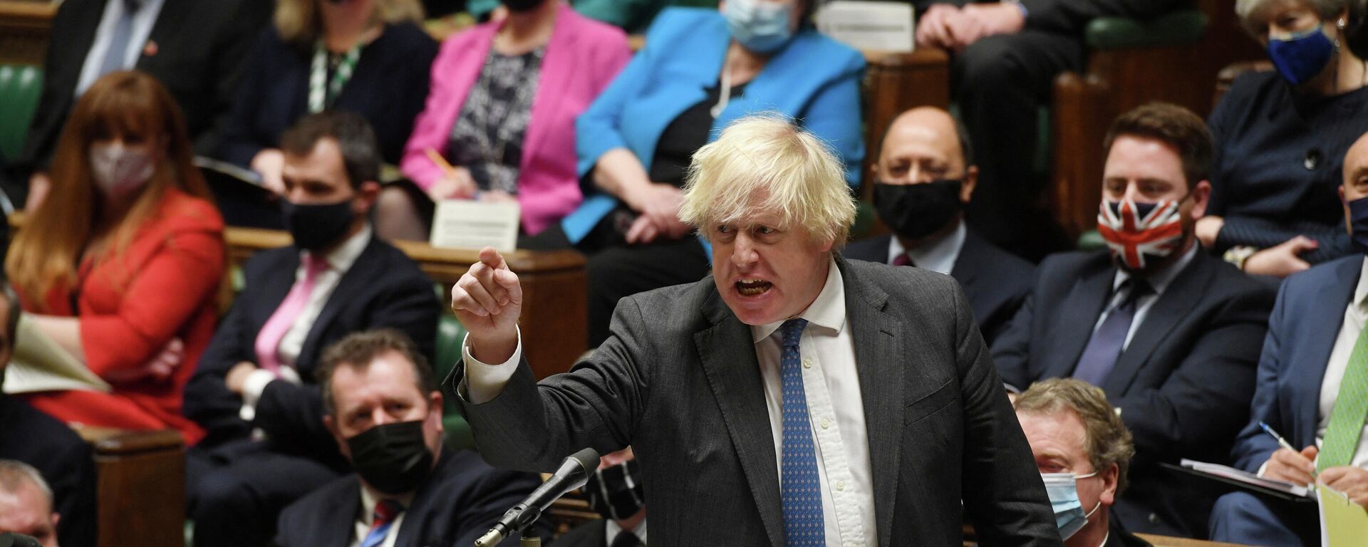 British Prime Minister Boris Johnson speaks during the weekly question time debate in Parliament in London, Britain December 15, 2021.  - Sputnik International, 1920, 16.12.2021