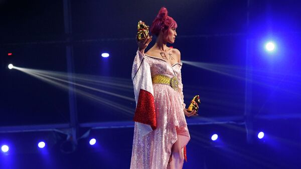 Japan's Juri Watanabe performs as she takes part in the National Costume portion of the Miss Universe pageant, in Eilat, Israel, Friday, Dec. 10, 2021 - Sputnik International