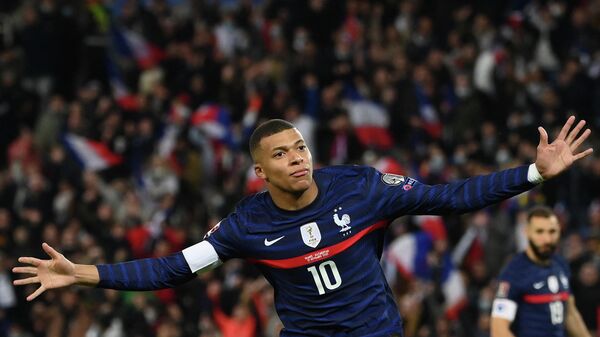 France's forward Kylian Mbappe celebrates after scoring a goal during the FIFA World Cup 2022 qualification football match between France and Kazakhstan  at the Parc des Princes stadium in Paris, on November 13, 2021 - Sputnik International