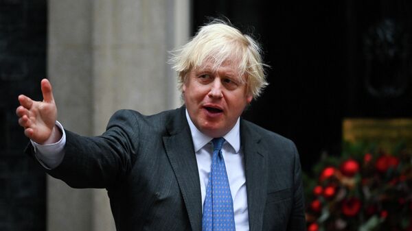 British Prime Minister Boris Johnson leaves Downing Street 10 to meet with Oman's Sultan Haitham bin Tariq, in London, Britain December 16, 2021. - Sputnik International