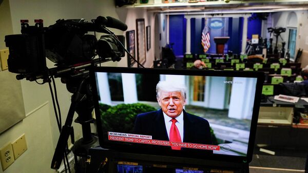 U.S. President Donald Trump is shown speaking on a monitor in the White House briefing room about the violence during the ratification of the 2020 election on January 6, 2021 in Washington, DC. Pro-Trump protesters have entered the U.S. Capitol building after mass demonstrations in the nation's capital. - Sputnik International