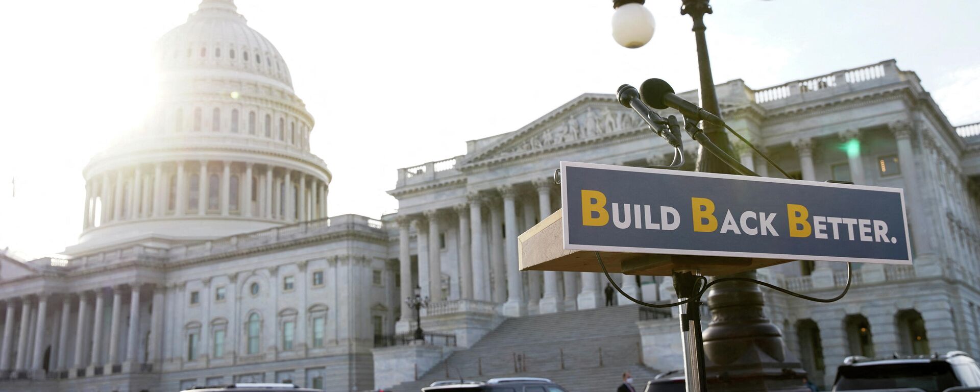 A lectern is seen before the start of a media event about the Build Back Better package with Senate Democrats outside the U.S. Capitol in Washington, December 15, 2021 - Sputnik International, 1920, 22.12.2021