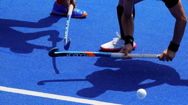 Argentina's Ignacio Horacio Ortiz, right, and India's Rupinder Pal Singh, left, battle for the ball during a men's field hockey match at the 2020 Summer Olympics, Thursday, July 29, 2021, in Tokyo, Japan. - Sputnik International