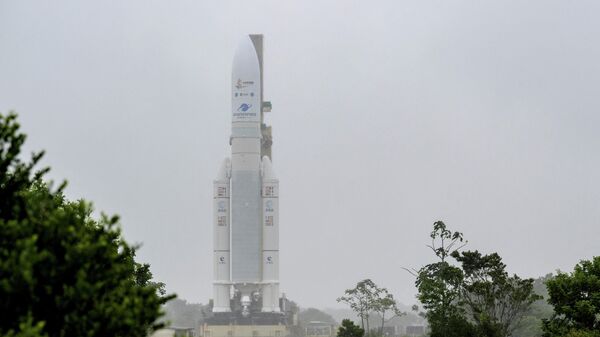 Arianespace's Ariane 5 rocket, with NASA's James Webb Space Telescope onboard, is rolled out to the launch pad at Europe’s Spaceport, the Guiana Space Center in Kourou, French Guiana December 23, 2021. - Sputnik International