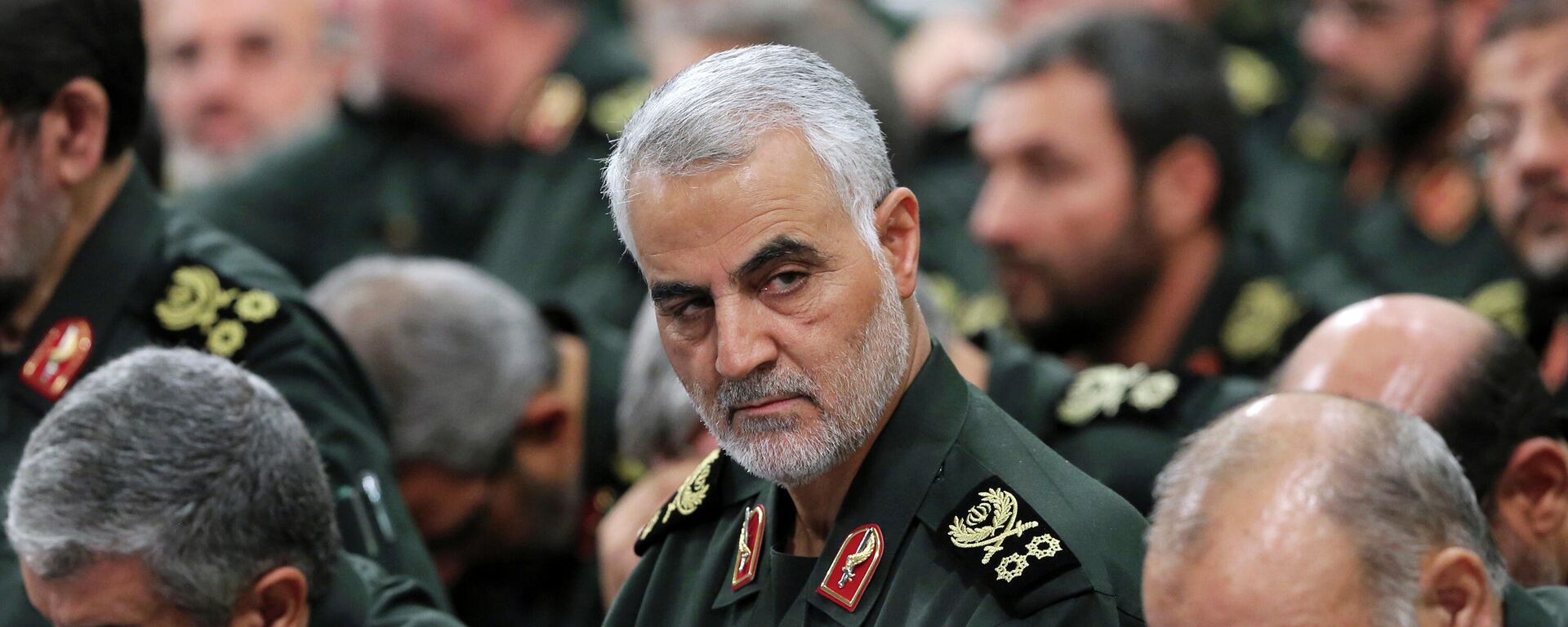 In this Sept. 18, 2016, file photo provided by an official website of the office of the Iranian supreme leader, Revolutionary Guard Gen. Qassem Soleimani, center, attends a meeting in Tehran, Iran. Iran executed Mahmoud Mousavi Majd convicted of providing information to the United States and Israel about the prominent Revolutionary Guard general later killed by a U.S. drone strike, state TV reported on Monday, July 20, 2020. (Office of the Iranian Supreme Leader via AP, File) - Sputnik International, 1920, 13.04.2022