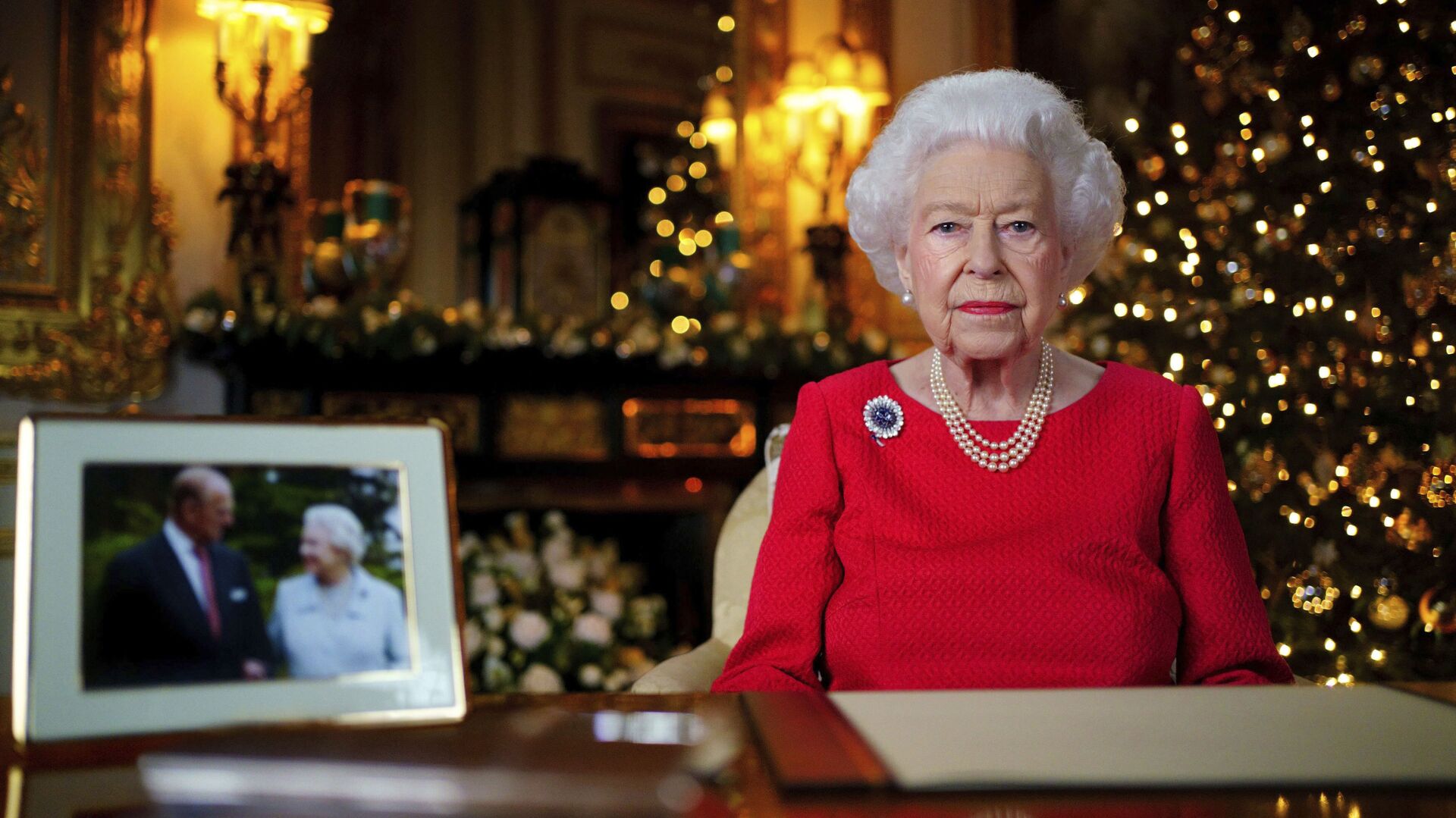 Королева Великобритании Елизавета II в рождественской трансляции в Виндзорском замке, Англия - Sputnik International, 1920, 20.02.2022
