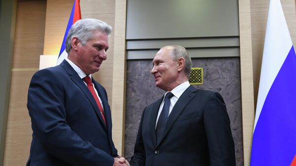 Russian President Vladimir Putin shakes hands with Cuban President Miguel Diaz-Canel during their meeting at Novo-Ogarevo residence, outside Moscow, Russia. - Sputnik International
