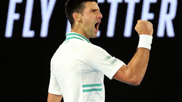 (FILES) In this file photo taken on February 21, 2021, Serbia's Novak Djokovic reacts on a point against Russia's Daniil Medvedev during their men's singles final match on day fourteen of the Australian Open tennis tournament in Melbourne - Sputnik International