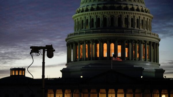 A surveillance camera stands near the East Front of the U.S. Capitol at sunset on January 5, 2022 in Washington, DC - Sputnik International