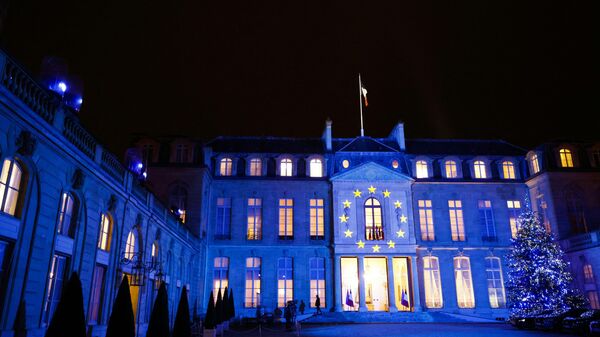 The Elysee presidential palace is litten with the colours of the European flag on January 6, 2022 in Paris to mark the French presidency of the European Union, as France took over the rotating presidency of the EU on January 1, 2022. - To mark the start of the six-month EU presidency, historic buildings across the country have been illuminated in the blue of the EU flag on New Year's Eve, including the Elysee Palace and the Eiffel Tower.  - Sputnik International