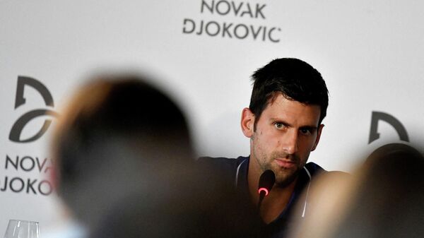 FILE PHOTO: world No.1 tennis player Novak Djokovic speaks during a news conference in Belgrade, Serbia July 26, 2017. - Sputnik International