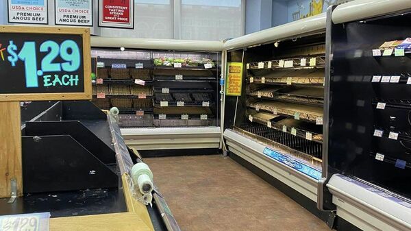 A photo of empty shelves in Philadelphia's supermarket shared on Twitter on January 9, 2022. - Sputnik International
