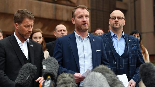 Abuse victims of former football coach Barry Bennell (L-R) Steve Walters, Micky Fallon and Chris Unsworth speak outside Liverpool Crown Court on February 19, 2018 after the sentencing of former football coach Barry Bennell who was found guilty of sexual abuse - Sputnik International