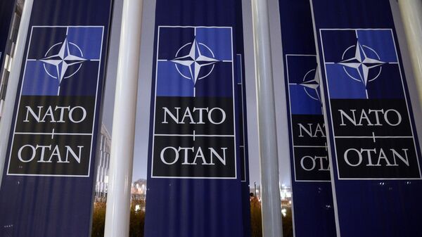 NATO banners in front of the organization's headquarters in Brussels - Sputnik International