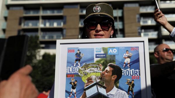 Supporters of Serbian tennis player Novak Djokovic rally outside the Park Hotel, where the star athlete is believed to be held while he stays in Australia, in Melbourne, Australia, January 9, 2022.  - Sputnik International