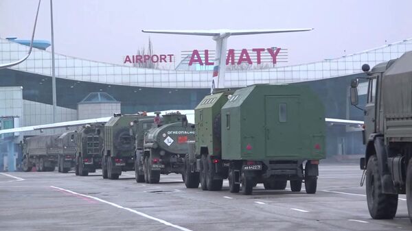 Russian military vehicles drives upon arrival at Almaty airport, as part of a peacekeeping mission of the Collective Security Treaty Organisation, in Almaty, Kazakhstan, in this still image from video released by Russia's Defence Ministry January 9, 2022 - Sputnik International