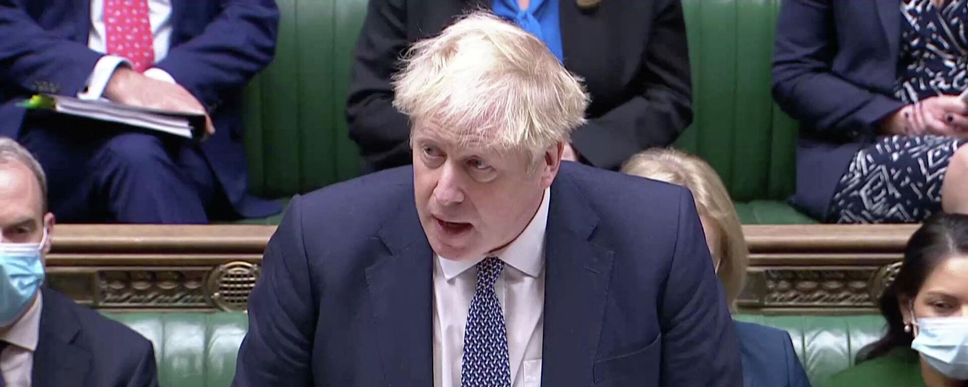 British Prime Minister Boris Johnson speaks during the weekly question time debate at Parliament in London, Britain, January 12, 2022 - Sputnik International, 1920, 14.01.2022