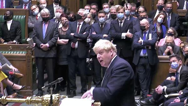 British Prime Minister Boris Johnson speaks during the weekly question time debate at Parliament in London, Britain, January 12, 2022 - Sputnik International