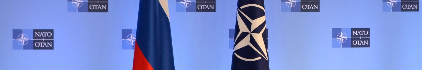 Russian and NATO flags are seen before the Russia - NATO talks in Brussels, Belgium - Sputnik International
