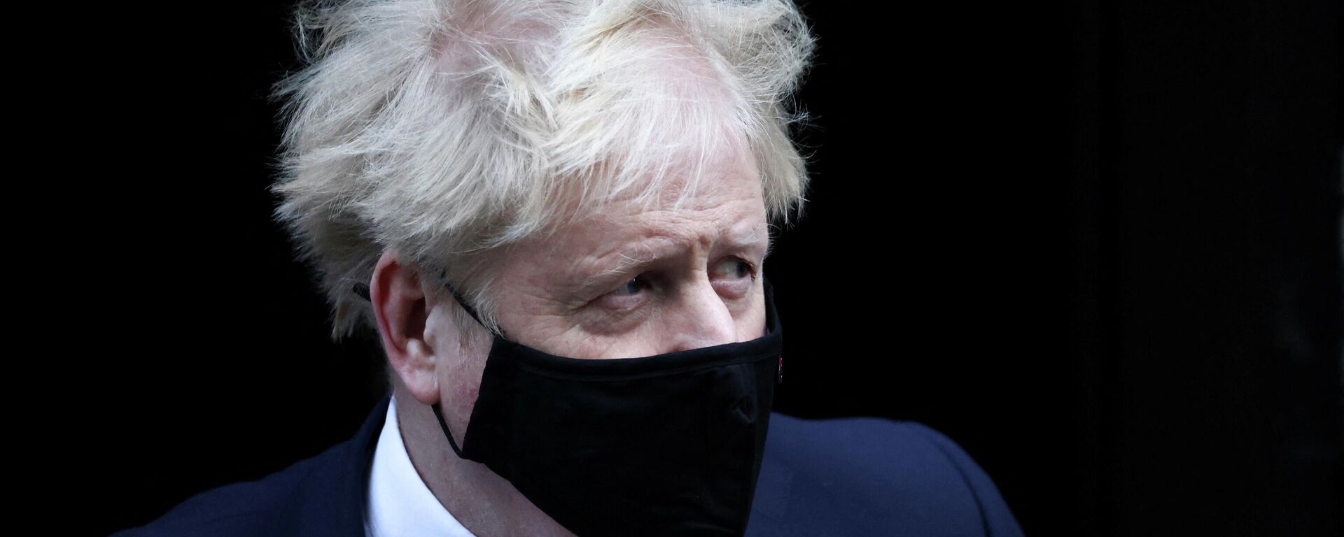 British Prime Minister Boris Johnson walks outside Downing Street in London, Britain, January 12, 2022.  - Sputnik International, 1920, 17.01.2022