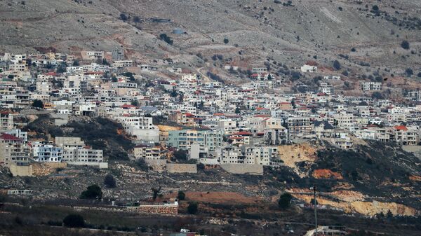 This picture shows a general view of the village of Majdal Shams in the Israeli-annexed Golan Heights, on December 28, 2021. - Israel's government approved on November 26, a one-billion-shekel plan ($320 million, 280 million euro) five-year plan to double the Jewish settler population on the Golan Heights, a strategic area that Israel seized from Syria in the 1967 Six-Day War. - Sputnik International