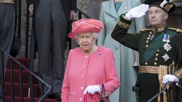 Britain's Queen Elizabeth II (C), and her children Britain's Prince Andrew, Duke of York (L), Britain's Prince Edward, Earl of Wessex (2L), and Britain's Princess Anne, Princess Royal, (2R) attend a garden party at the Palace of Holyroodhouse in Edinburgh on July 3, 2019 - Sputnik International