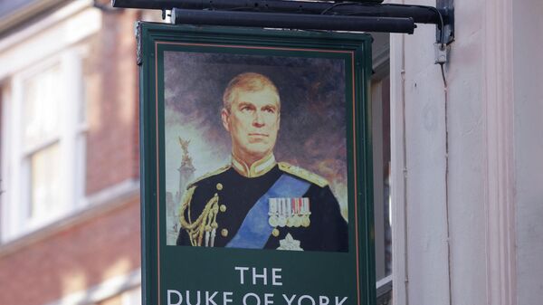 A portrait of Britain's Prince Andrew is seen on a sign outside the Duke of York public house in London - Sputnik International