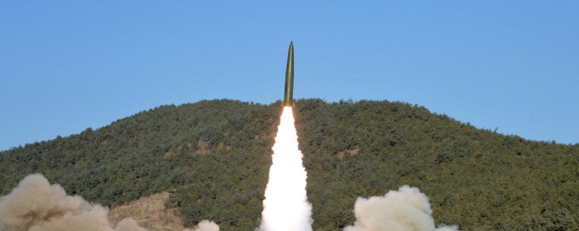 A DPRK railway-borne ballistic missile is launched in a January 14, 2022, test in western North Korea - Sputnik International, 1920, 20.02.2023