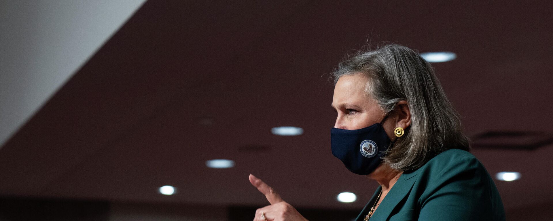 Victoria Nuland, Under Secretary of State for Political Affairs, points her finger while joking with a photographer before testifying during a Senate Foreign Relations hearing to examine U.S.-Russia policy at the U.S. Capitol in Washington, Tuesday, Dec. 7, 2021. (Sarahbeth Maney/The New York Times via AP, Pool) - Sputnik International, 1920, 15.01.2022