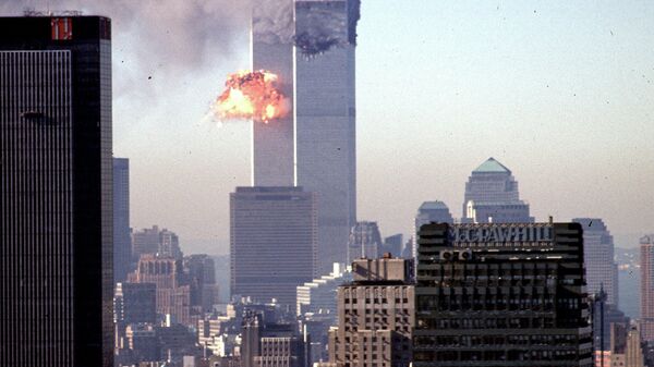 A hijacked commercial plane crashes into the World Trade Center 11 September 2001 in New York.  - Sputnik International