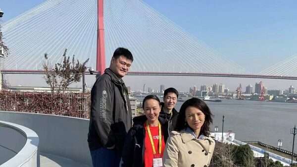 Chinese tennis player Peng Shuai, former NBA basketball player Yao Ming, sailboat racer Xu Lijia and retired Chinese table tennis player Wang Liqin are seen at an event in Shanghai, China in this still image uploaded to social media December 19, 2021. - Sputnik International