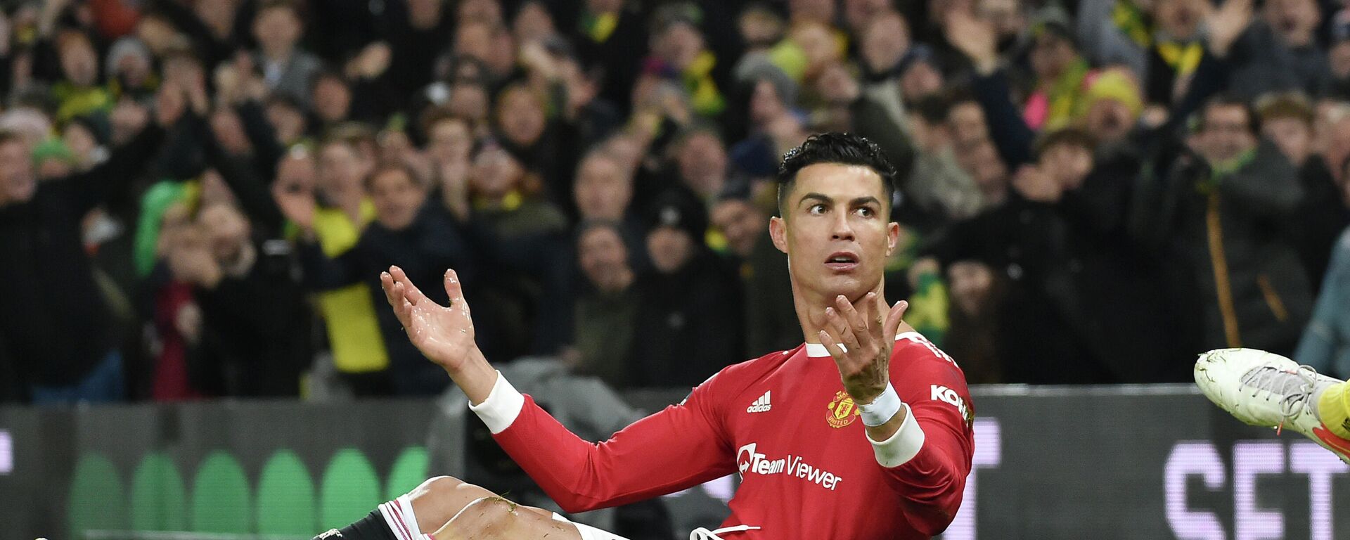 Manchester United's Cristiano Ronaldo reacts during the English Premier League soccer match between Norwich City and Manchester United at Carrow road in Norwich, England, Saturday, Dec.11, 2021 - Sputnik International, 1920, 12.02.2022