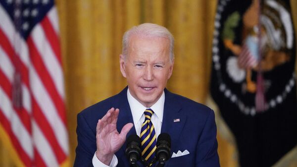 US President Joe Biden speaks during a press conference on the eve of his first year in office, from the East Room of the White House in Washington, DC on January 19, 2022. - Sputnik International