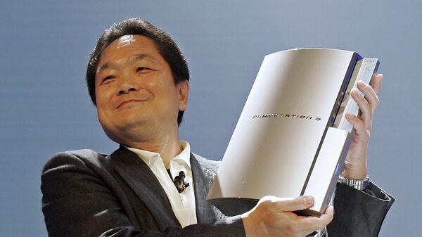 Ken Kutaragi, president and CEO of Sony Computer Entertainment Inc., holds up a prototype of the new Playsation 3 computer entertainment system during a news conference in Culver City, Calif., Monday, May 16, 2005. - Sputnik International