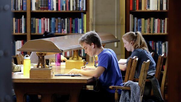 In this photo taken Tuesday, Oct. 15, 2013, University of Washington students study in Odegaard Library on the campus in Seattle.  - Sputnik International
