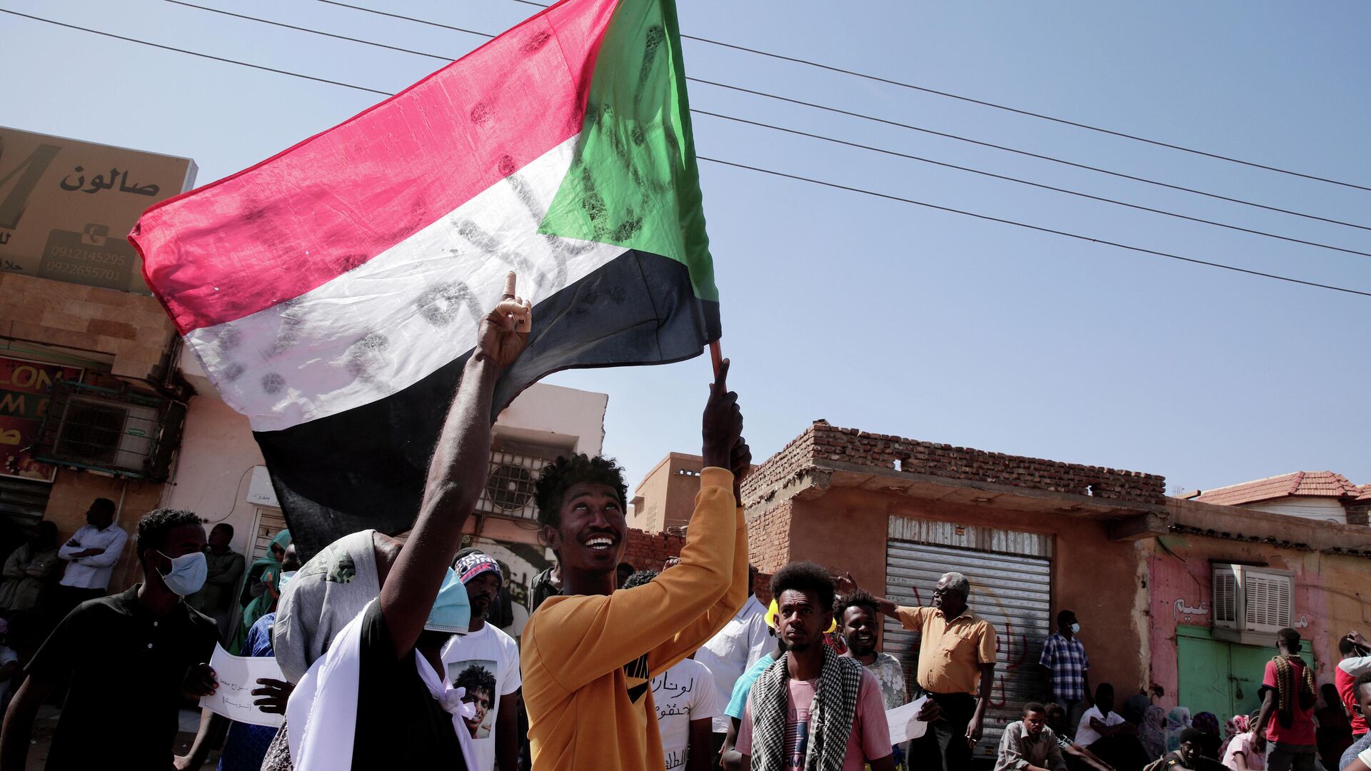 People chant slogans during a demonstration against the killing of dozens by Sudanese security forces since a military coup three months ago, in Khartoum, Sudan, Monday, Jan. 24, 2022 - Sputnik International, 1920, 24.01.2022