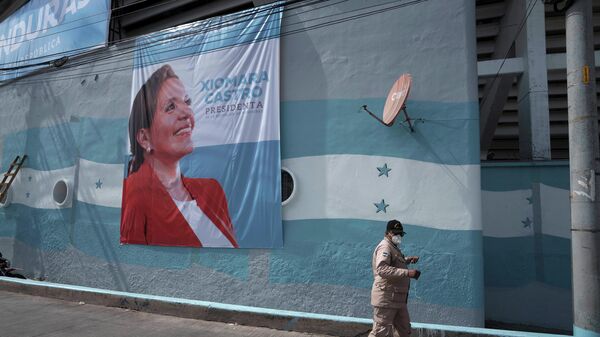 A banner promoting President-elect Xiomara Castro hangs on a wall at the National Stadium in Tegucigalpa, Honduras, Wednesday, Jan. 26, 2022. Castro, Honduras' first female president, is scheduled to be sworn in during a ceremony at the stadium on Thursday, Jan. 27.  - Sputnik International