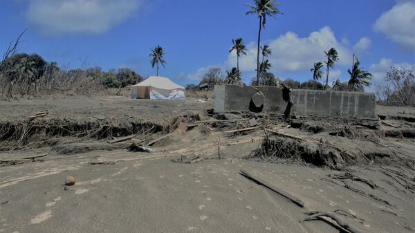 FILE PHOTO: A general view shows damaged buildings and landscape covered with ash following volcanic eruption and tsunami in Kanokupolu, Tonga, January 23,2022 - Sputnik International