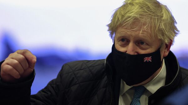 British Prime Minister Boris Johnson gestures during a visit at RAF Valley in Anglesey, Britain January 27, 2022 - Sputnik International