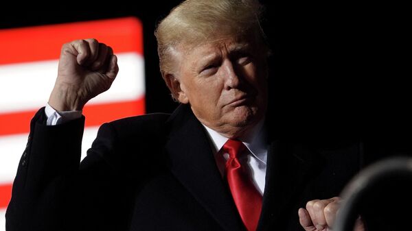 Former U.S. President Donald Trump gestures as he speaks during a rally, in Conroe, Texas, U.S., January 29, 2022 - Sputnik International