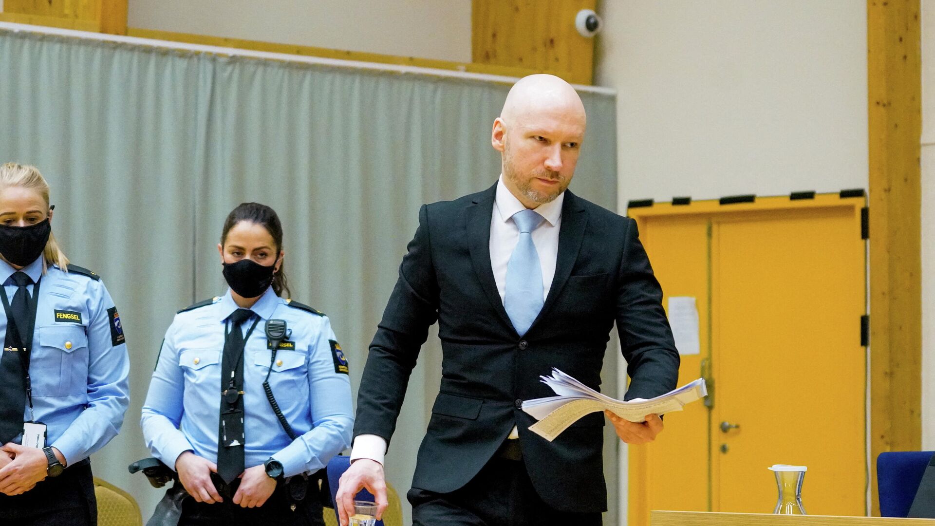 Mass killer Anders Behring Breivik, arrives at the makeshift courtroom in Skien prison on the second day of the trial, where he is requesting release on parole, in Skien, Norway January 19, 2022. Ole Berg-Rusten/NTB/via REUTERS   - Sputnik International, 1920, 01.02.2022