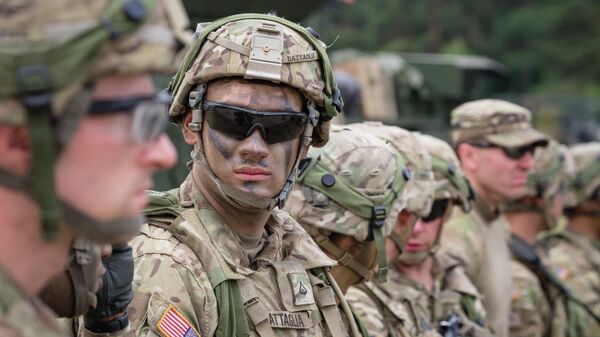 American Soldiers are seen during NATO Saber Strike military exercises on June 16, 2017 in Orzysz, Poland.  - Sputnik International