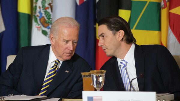  In this Jan. 26, 2015 file photo, Vice President Joe Biden, left, talks with State Department Special Envoy for International Energy Affairs Amos Hochstein during the Caribbean Energy Security Summit, at the State Department in Washington.  - Sputnik International