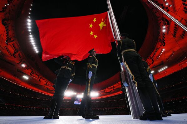 2022 Beijing Olympics - Opening Ceremony at the National Stadium, Beijing, China on 4 February 2022. The Chinese flag is raised during the opening ceremony. - Sputnik International
