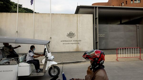 Motorists ride past the Australian Embassy in Bangkok on February 5, 2022.  - Sputnik International