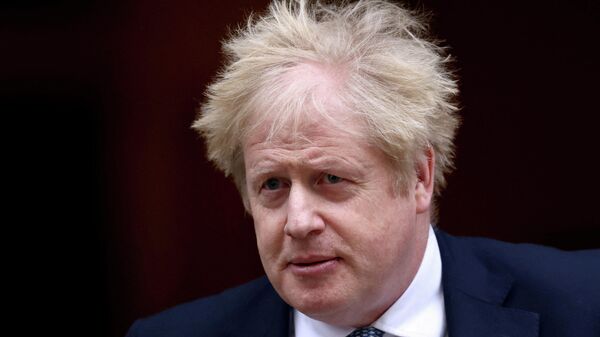 British Prime Minister Boris Johnson walks outside Downing Street in London, Britain, February 2, 2022 - Sputnik International