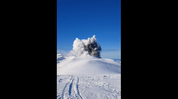 A screenshot of a video, taken by photographer Elena Kotenko, depicting an eruption of the Ebeko volcano, Kuril Islands, Russia. 6 February 2022 - Sputnik International