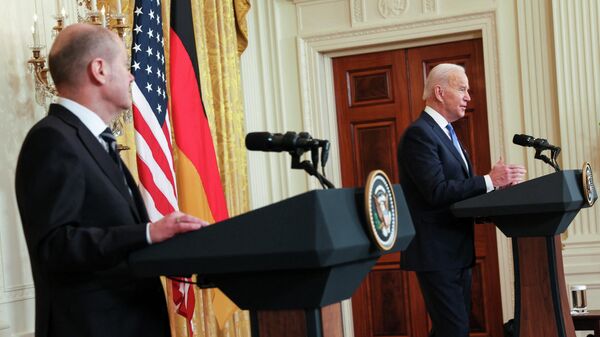 U.S. President Joe Biden holds a joint news conference with German Chancellor Olaf Scholz at the White House in Washington, U.S. February 7, 2022. - Sputnik International