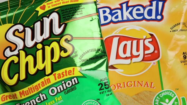 FILE- In this June 15, 2007, file photo bags of potato chips from PepsiCo's Frito-Lay division are shown in New York - Sputnik International